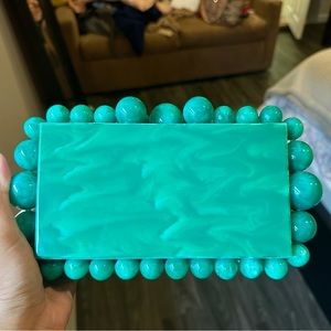 Green swirl acrylic bubble clutch with removable gold chain